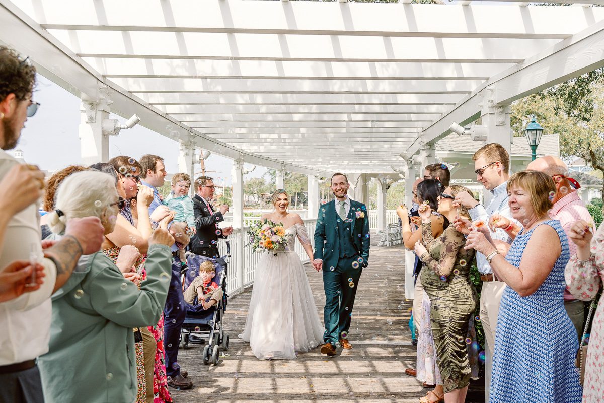 Bubble exit at Sea Breeze Point for a Disney Fairytale Wedding by top Orlando photographer