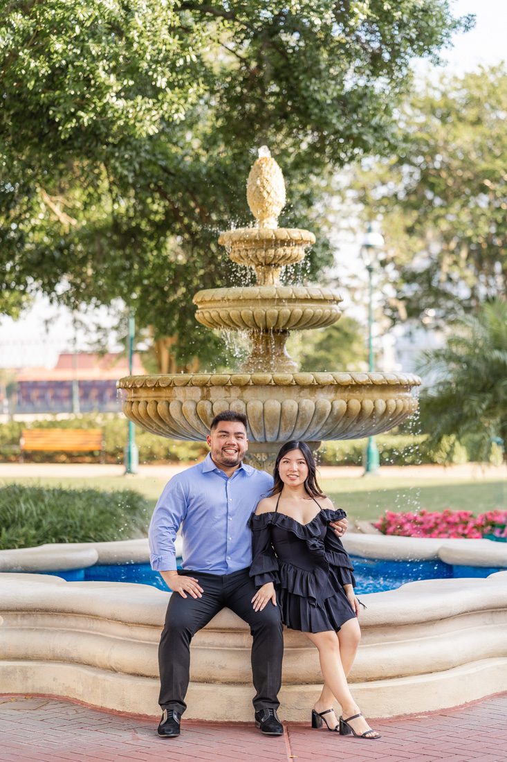 Romantic editorial engagement photography session at Disney's Grand Floridian in Orlando with fountain