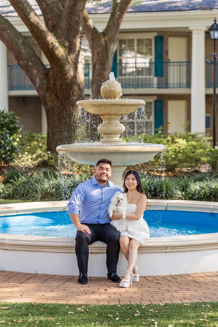 Port Orleans Riverside engagement session with adorable dog at the water fountain