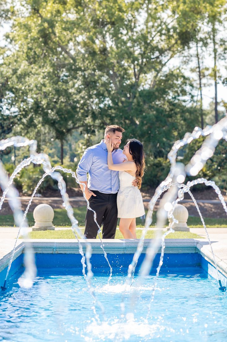 Creative artistic engagement photography with a water fountain at Port Orleans Riverside Disney World