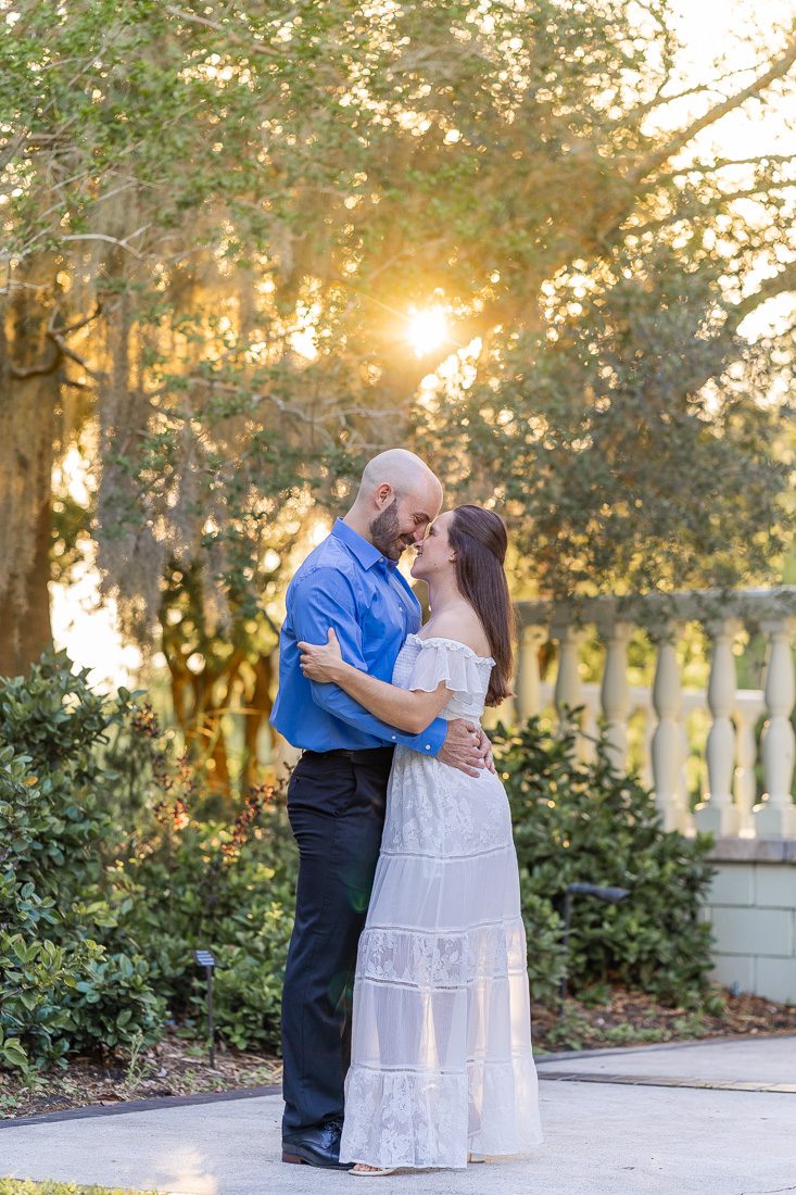 Golden hour sunset photo at Leu Gardens in Orlando for a romantic and fun engagement session by top photographer