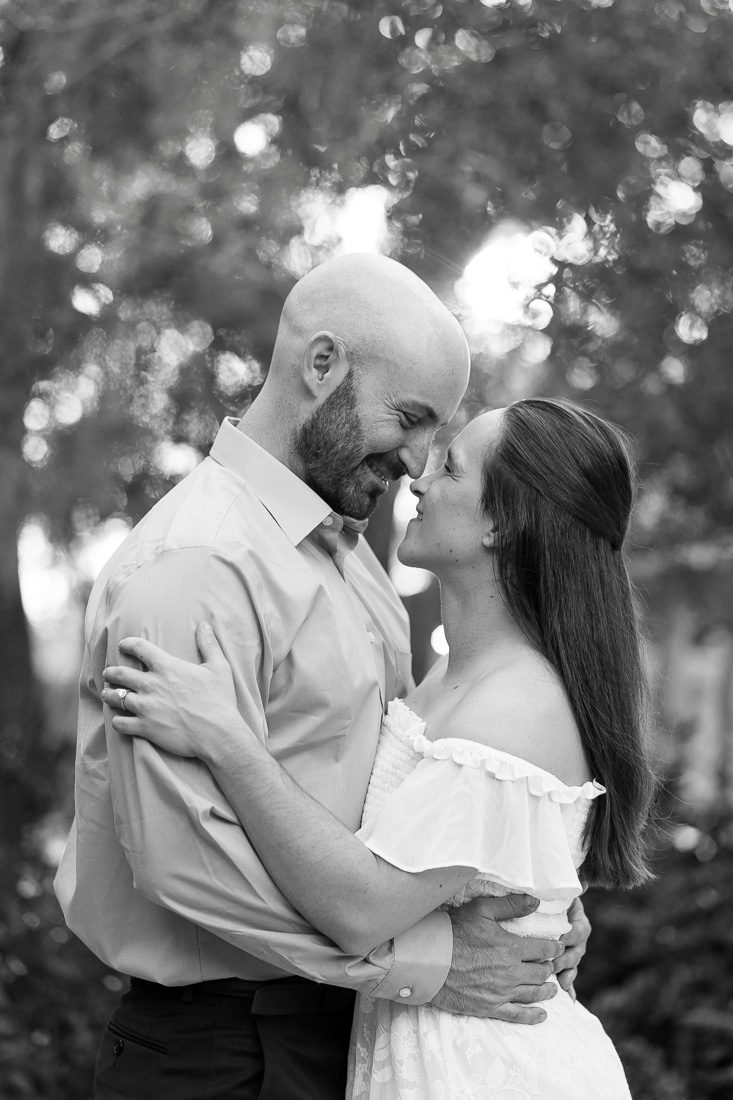 Black and white portrait of engaged couple during their Orlando engagement photography session with Elle