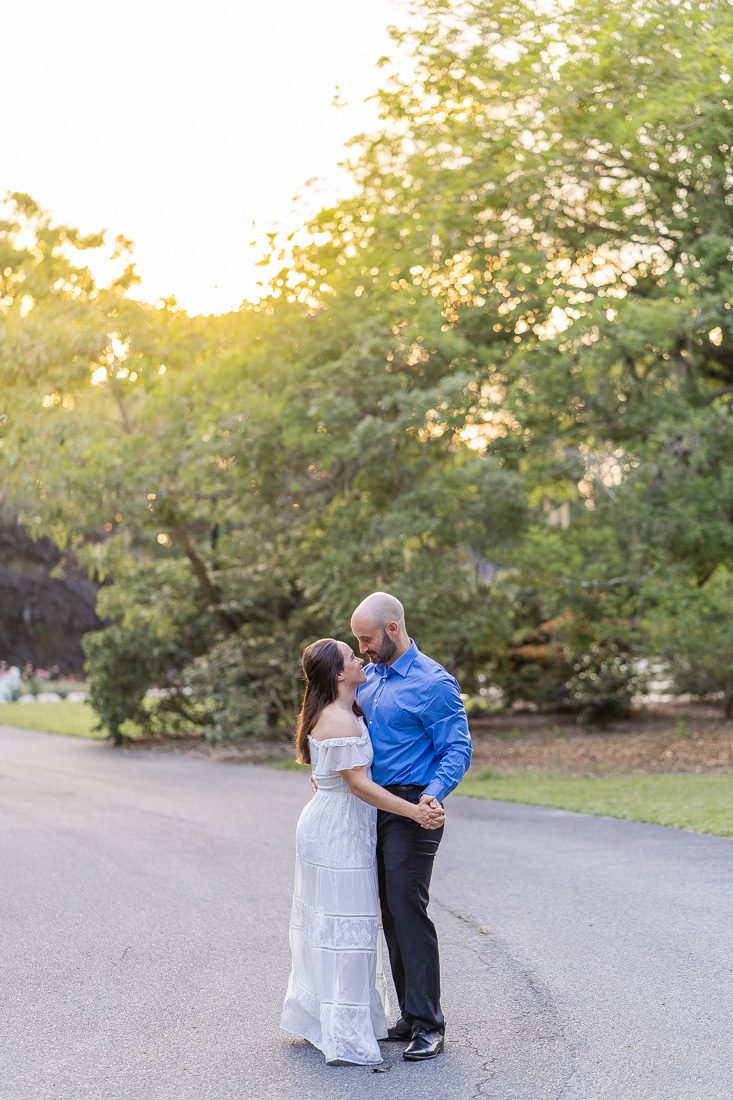 Golden hour sunset photo at Leu Gardens in Orlando for a romantic and fun engagement session by top photographer