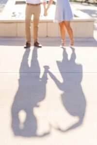 Creative and fun engagement photo idea with shadows by top Orlando photographer and videographer