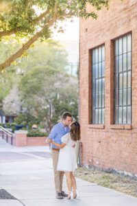 Engagement photography session in Orlando with brick wall and old vintage buildings in Winter Garden