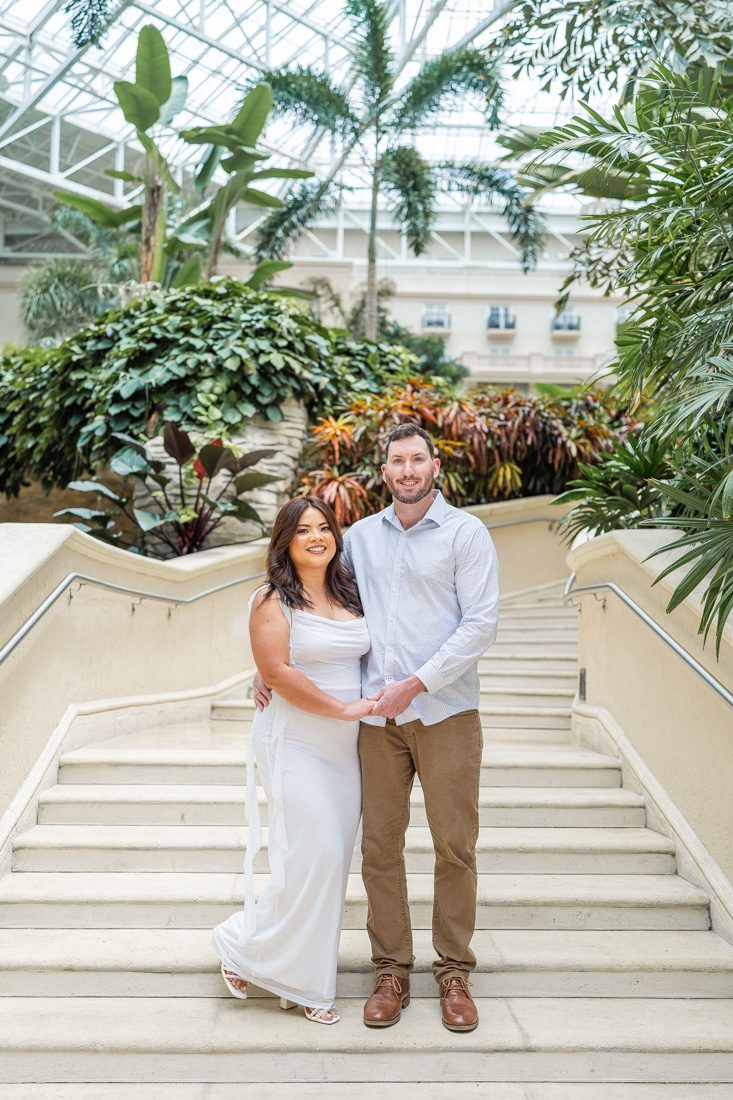 Grand staircase location for an indoor engagement session in Orlando by top photographer Elle