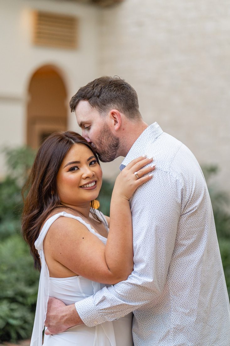 Gaylord Palms indoor atrium engagement photography session with light and airy edit