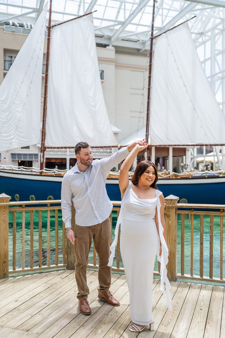 Unique indoor location for engagement photography with a sailboat at Gaylord Palms