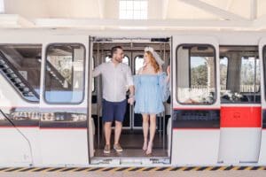 Top Orlando photographer captures a photo riding the monorail during a fun engagement session