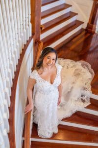 Wedding photos on the staircase at Luxemore Grand Estate by Orlando wedding photographer and videographer team