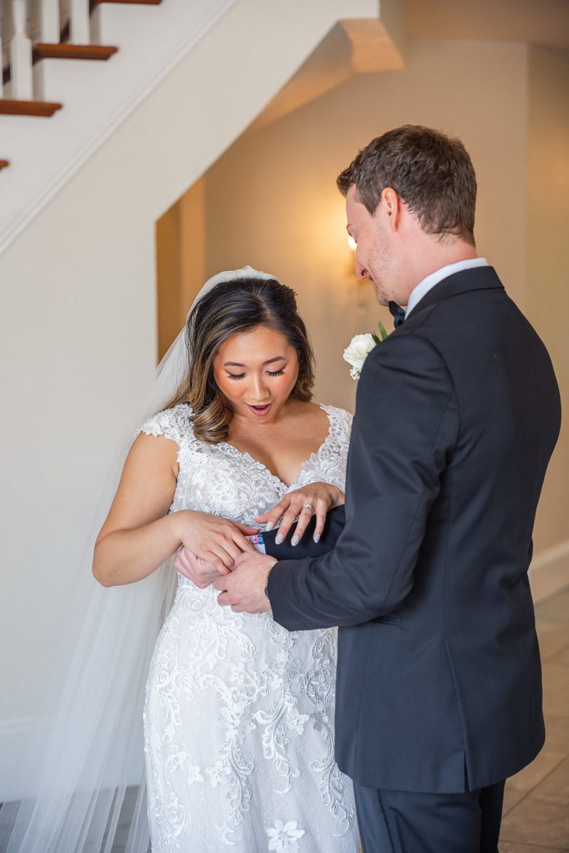 Romantic first look on staircase at Luxmore Grande Estate venue near Orlando Florida