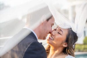 Under veil wedding photo at Luxmore Grande Estate by top Orlando photographer and videographer