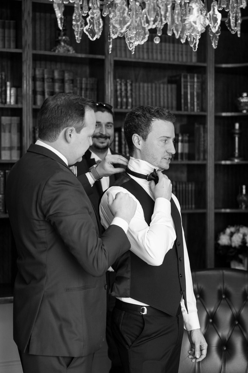 Groom prep at Luxmore Grande Estate captured by top Orlando wedding photographer and videographer