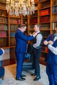 Groom prep at Luxmore Grande Estate captured by top Orlando wedding photographer and videographer