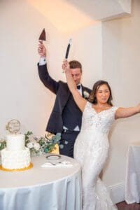 Joyful fun romantic reception photos with a creative shutter drag and dancing by top Orlando photo and video