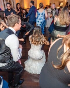 Fun candid dancing shots at Luxmore Grande Estate wedding reception by Orlando photographer