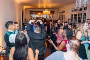 Fun candid dancing shots at Luxmore Grande Estate wedding reception by Orlando photographer