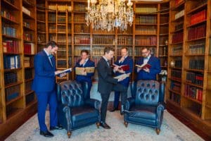 Groom prep at Luxmore Grande Estate captured by top Orlando wedding photographer and videographer