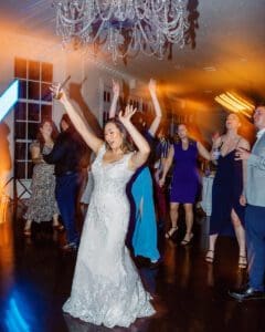 Fun candid dancing shots at Luxmore Grande Estate wedding reception by Orlando photographer