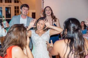Fun candid dancing shots at Luxmore Grande Estate wedding reception by Orlando photographer