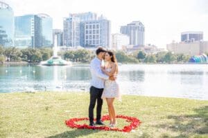 Orlando proposal photographer documents the exact moment of a surprise engagement at Lake Eola park.