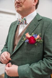 Elegant groom detail portrait captured before the wedding ceremony.