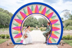 Romantic wedding portraits in the Rose Garden at Harry P. Leu Gardens by top wedding photographer in Orlando.