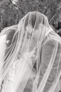 Romantic bride and groom portrait captured at Harry P. Leu Gardens by a top Orlando wedding photographer.