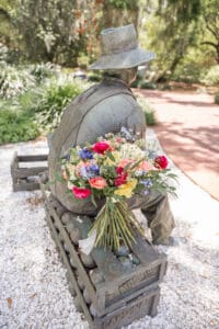 Spring wedding portraits featuring a pastel rainbow color palette at Harry P. Leu Gardens.