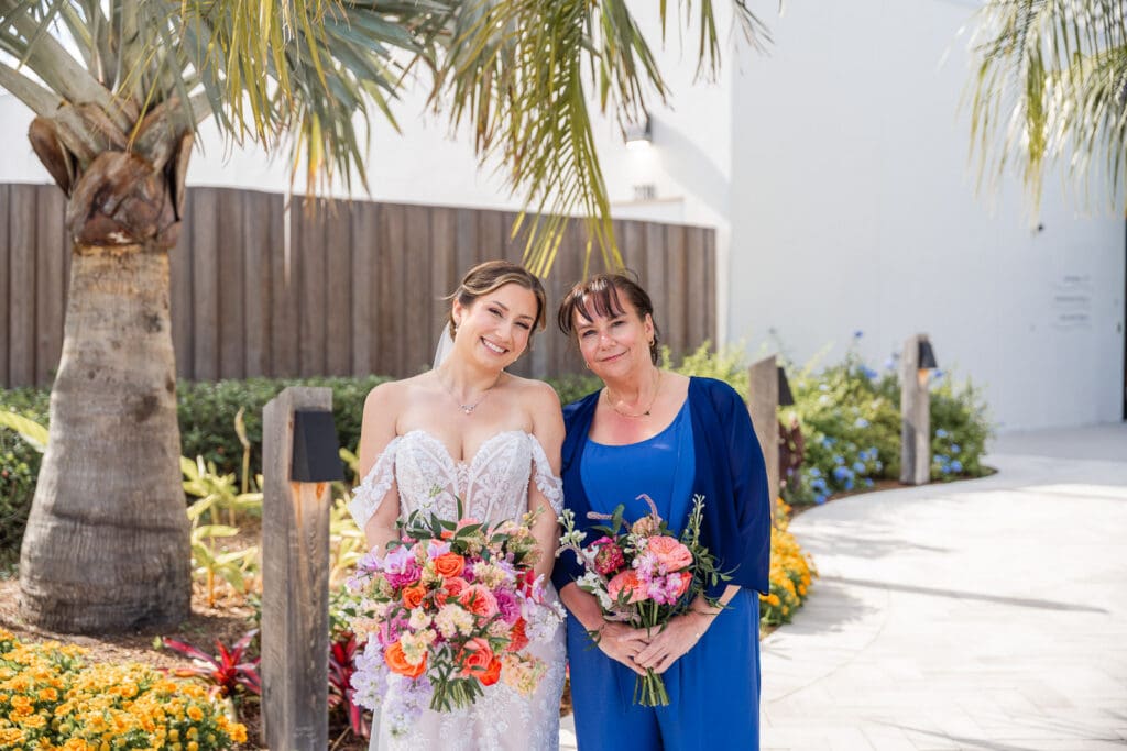 Bride shares a heartfelt moment with her mother before the ceremony at Evermore Resort in Orlando, beautifully captured by Elle, top Wedding Photographer & Videographer.