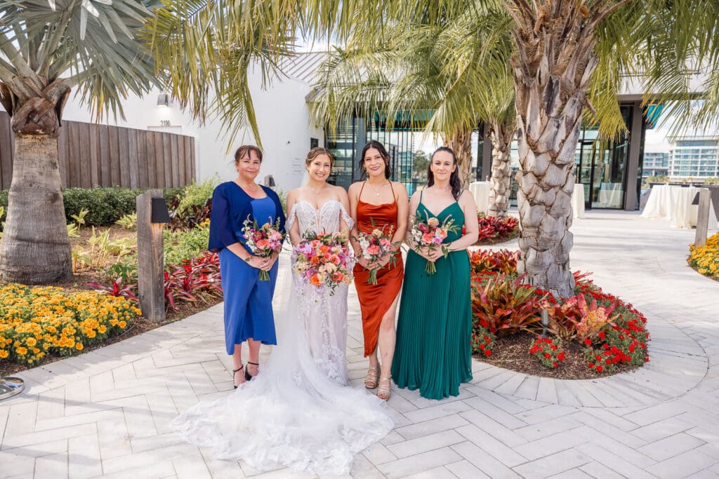 Colorful bridal party portraits at Evermore Resort in Orlando Captured by Elle, top Orlando wedding photographer & videographer specializing in timeless celebrations.