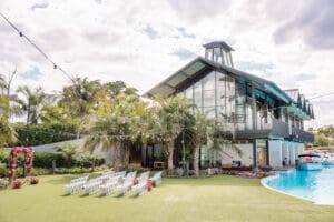 Modern waterfront architecture and ceremony lawn at Evermore Resort in Orlando, photographed by Captured by Elle wedding photography